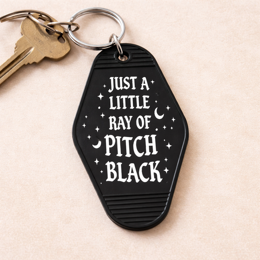 Just a Little Ray of Pitch Black Room Keychain