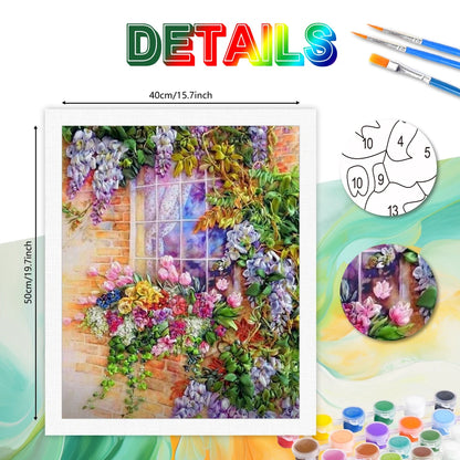 Decorative painting kit with floral design, brushes, and color bottles on a colorful background.