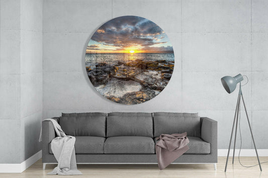 Round Sunset Over Mossy Rock Shore Glass Wall Art