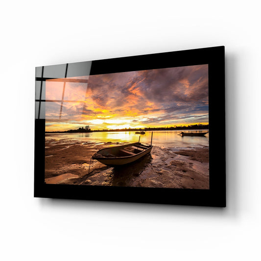 Fiery Dusk Stranded Boat Glass Wall Art