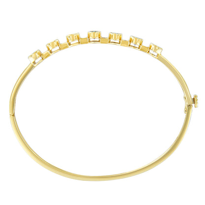 14K Yellow Gold Alternating Bezel Set 5MM Oval Shaped Tanzanite and 1/5 Cttw Diamond Bangle Bracelet (H-I Color, VS2-SI1 Clarity) - Fit's wrists up to 7.25" Inches
