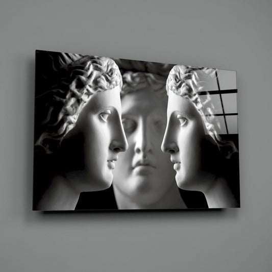 Black and White Mirrored Statue Faces Glass Wall Art